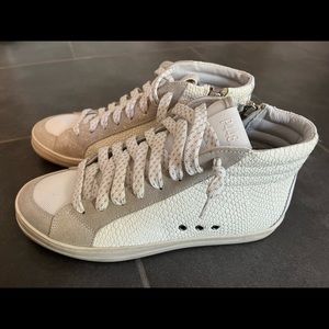 P448 size 39. Worn one time, look brand new.